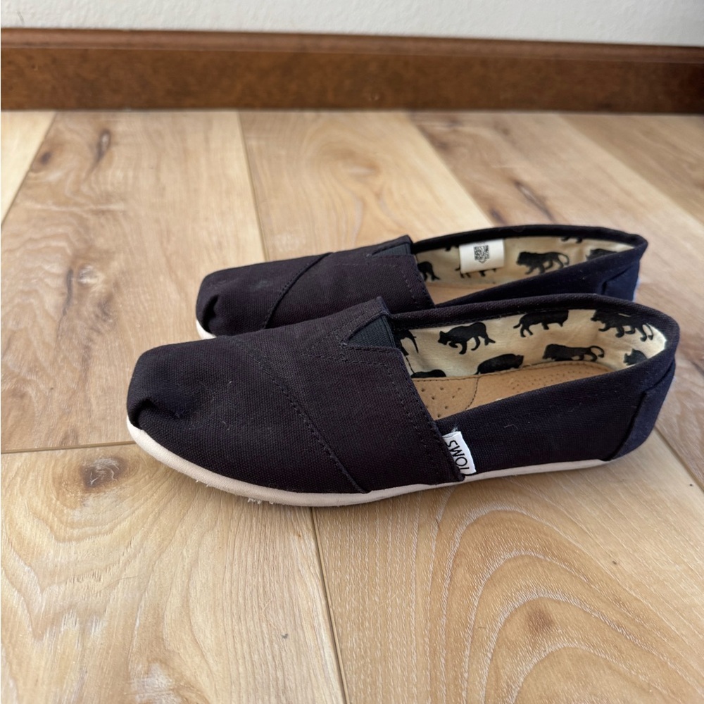 Tom’s Black Slip-On Shoes